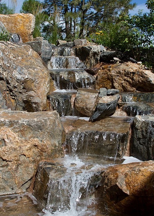 Boulder waterfall feature