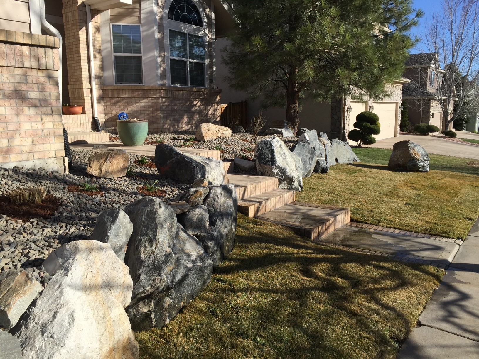 Boulders as retaining wall