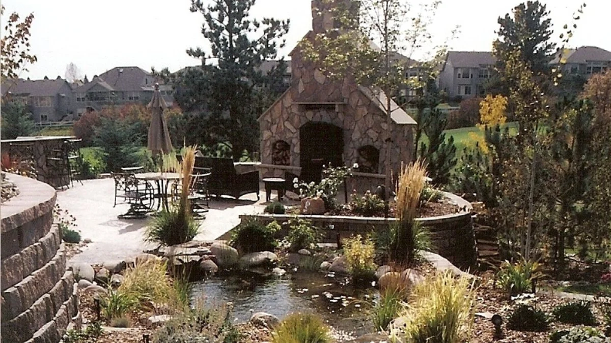 Outdoor fireplace with pond feature